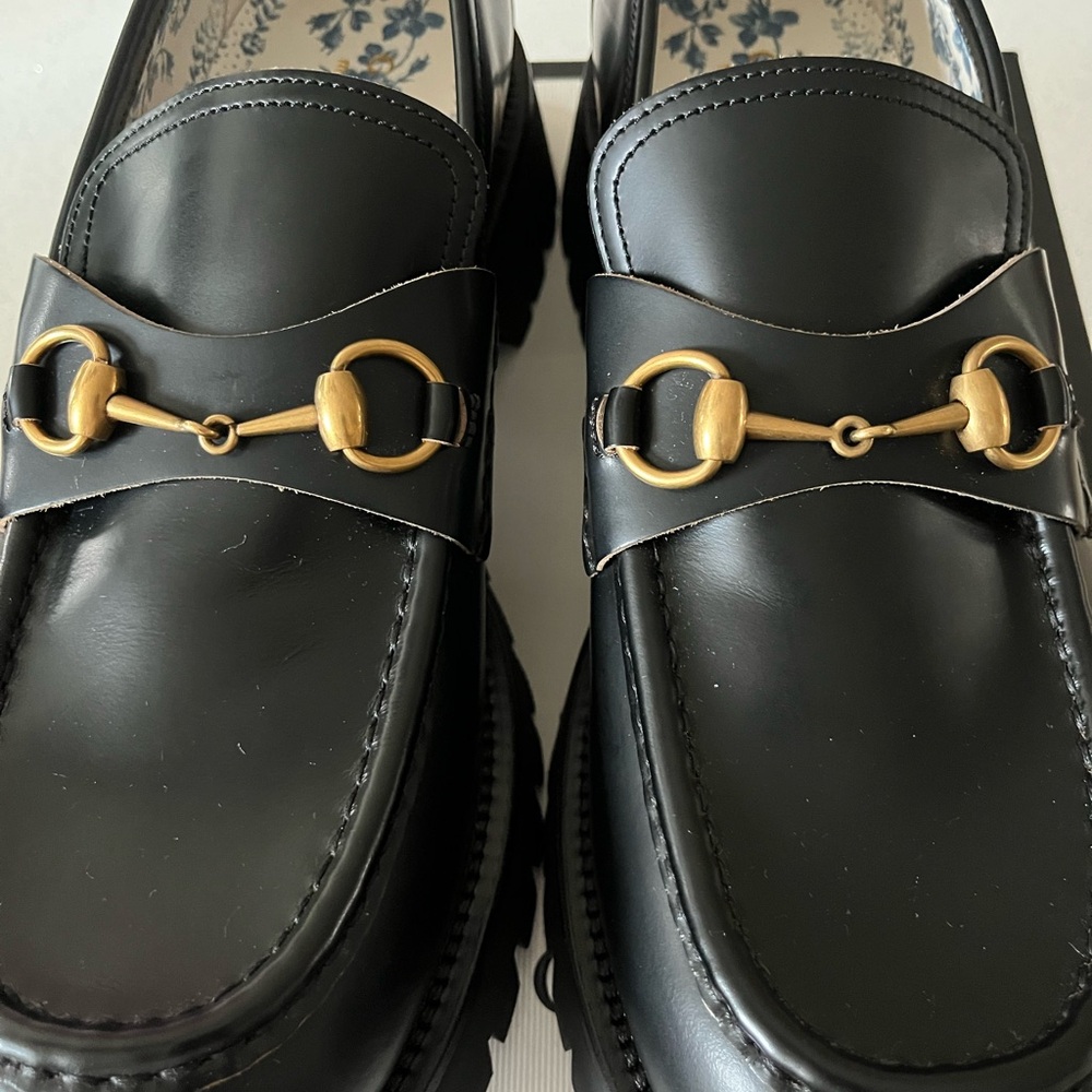 Gucci Black Loafers with Gold Accents